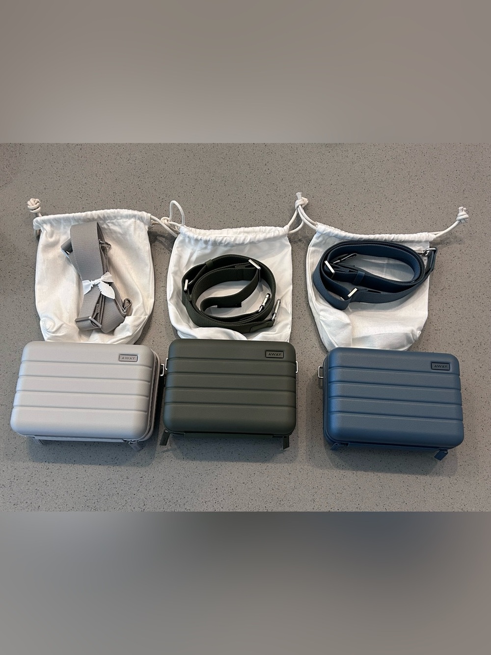 Away Trio Hard-Shell Crossbody Cases in Gray, Olive, and Navy with Straps